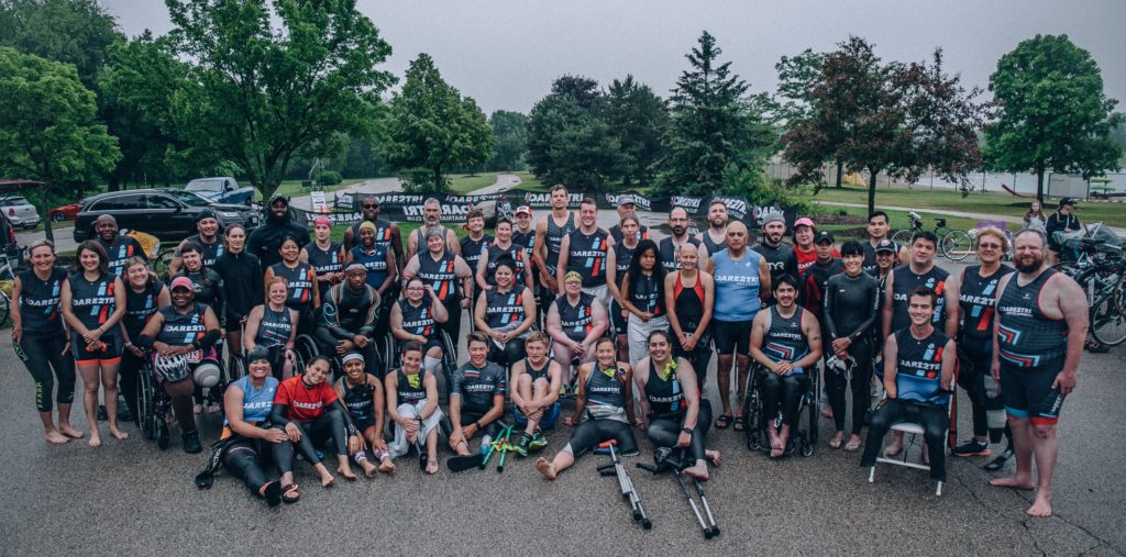 Dare2tri athletes pose for a group photo before a race.