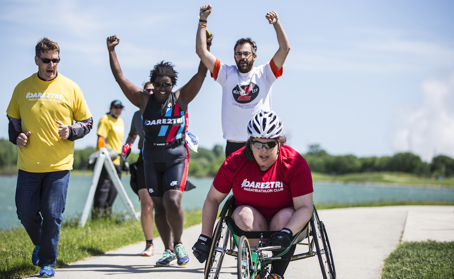 Kristen Cassarini using a racing wheelchair.