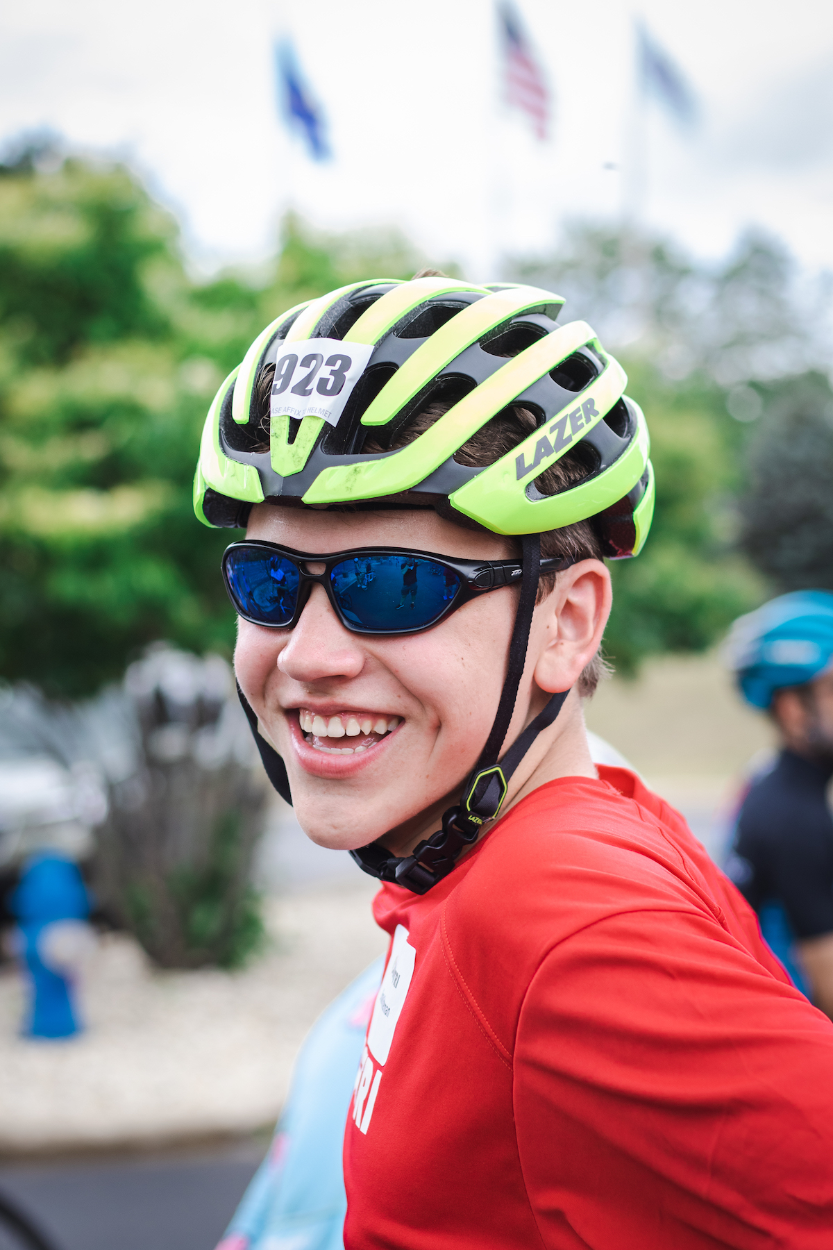 Brock Kitterman smiling with a bike helmet on.