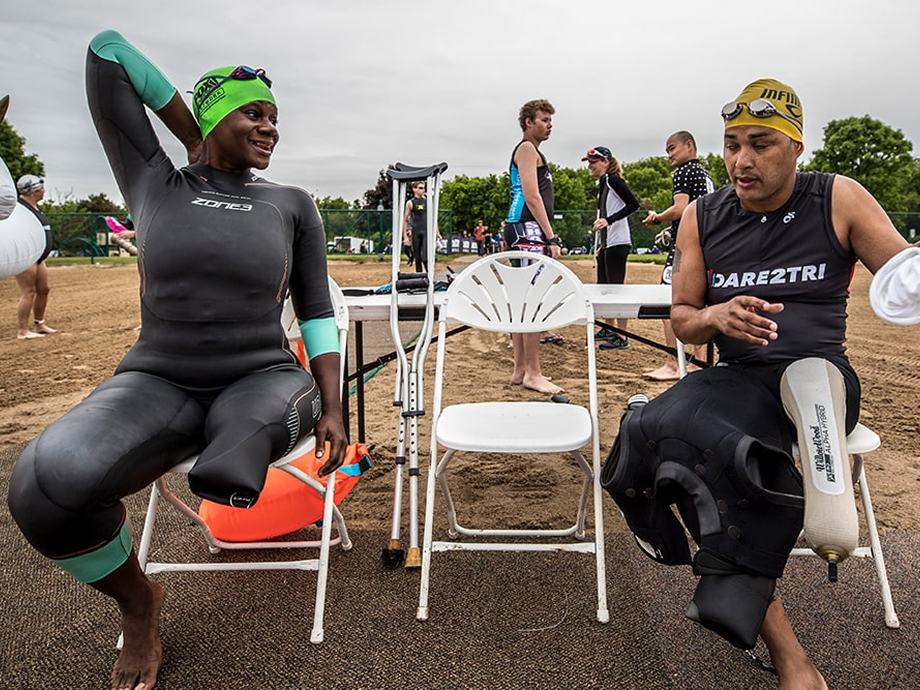 Dare2tri athletes sitting on chairs