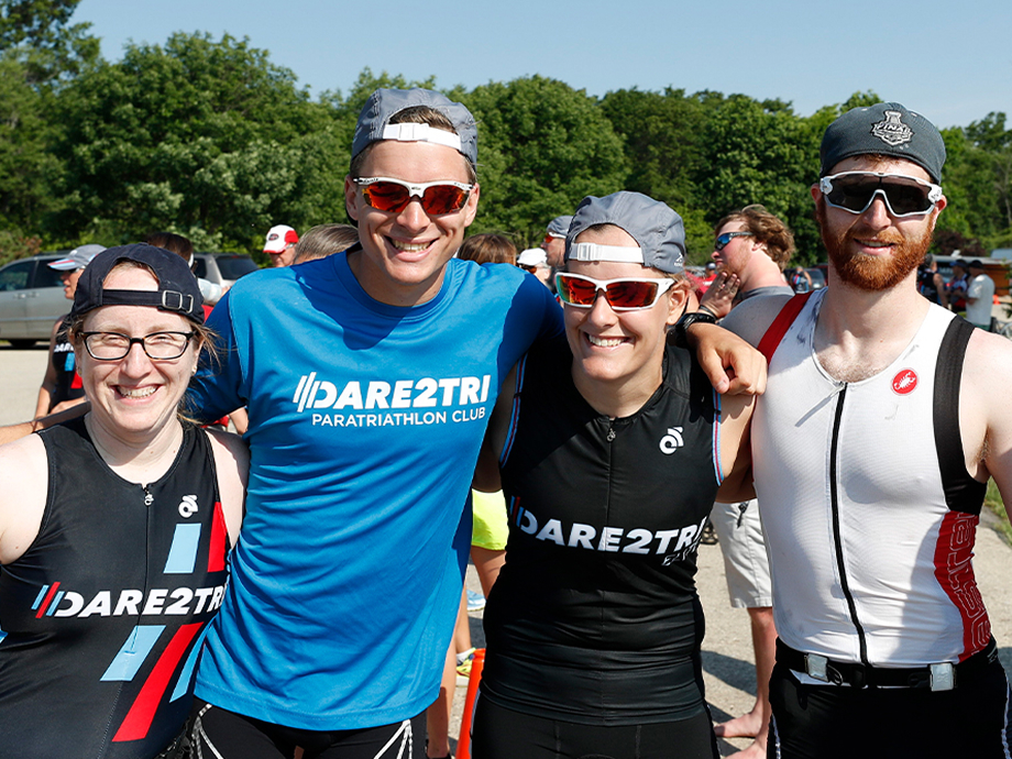 dare2tri members smiling at the camera